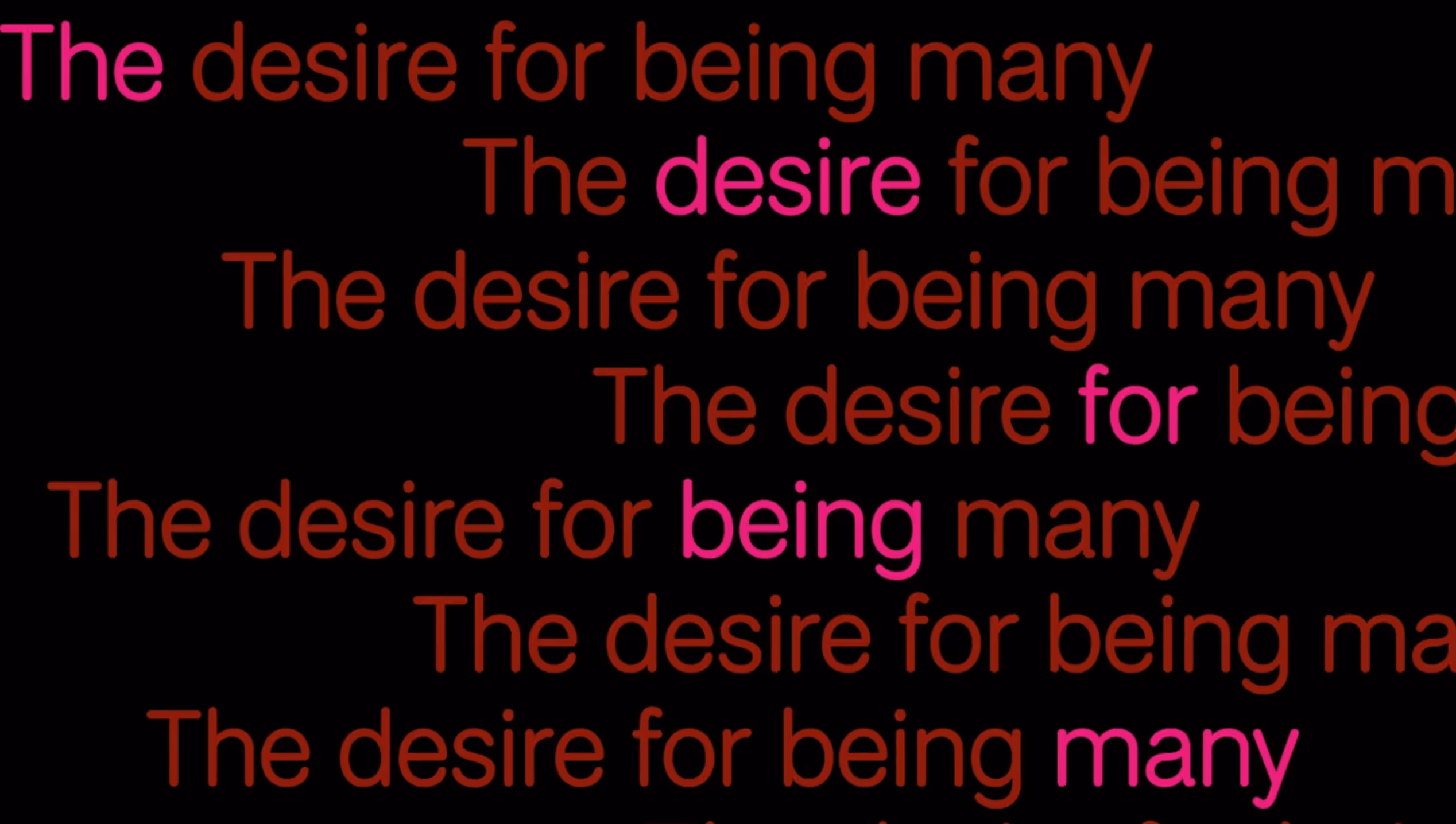 A typo illustration of red letters on black background stating "the desire of being many"