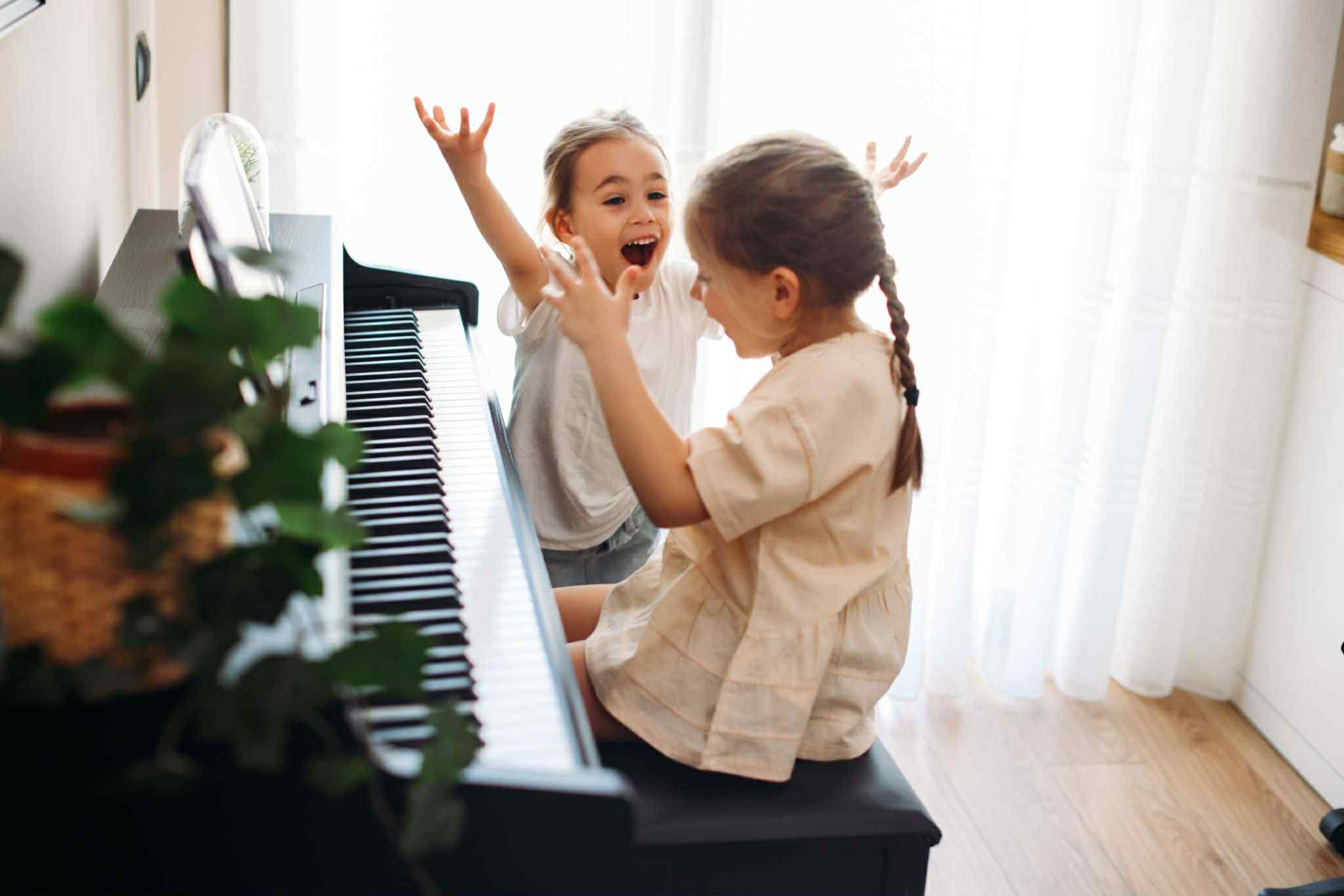 young kid learning piano lessons in bellevue