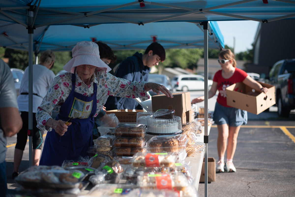 woman sorting food on table