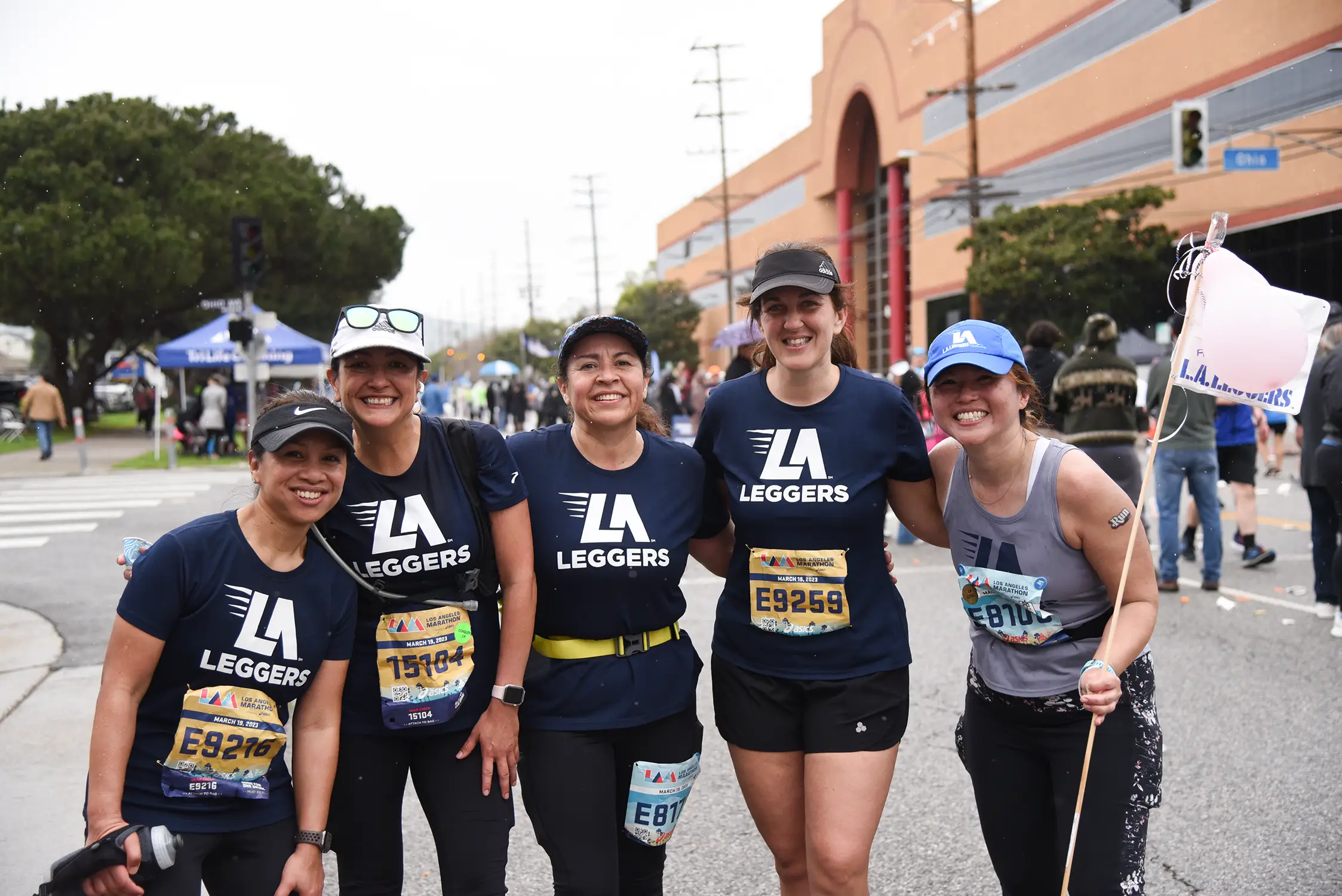LA Leggers runners wearing shirts with logo designed by Loc Tran during the LA Marathon.