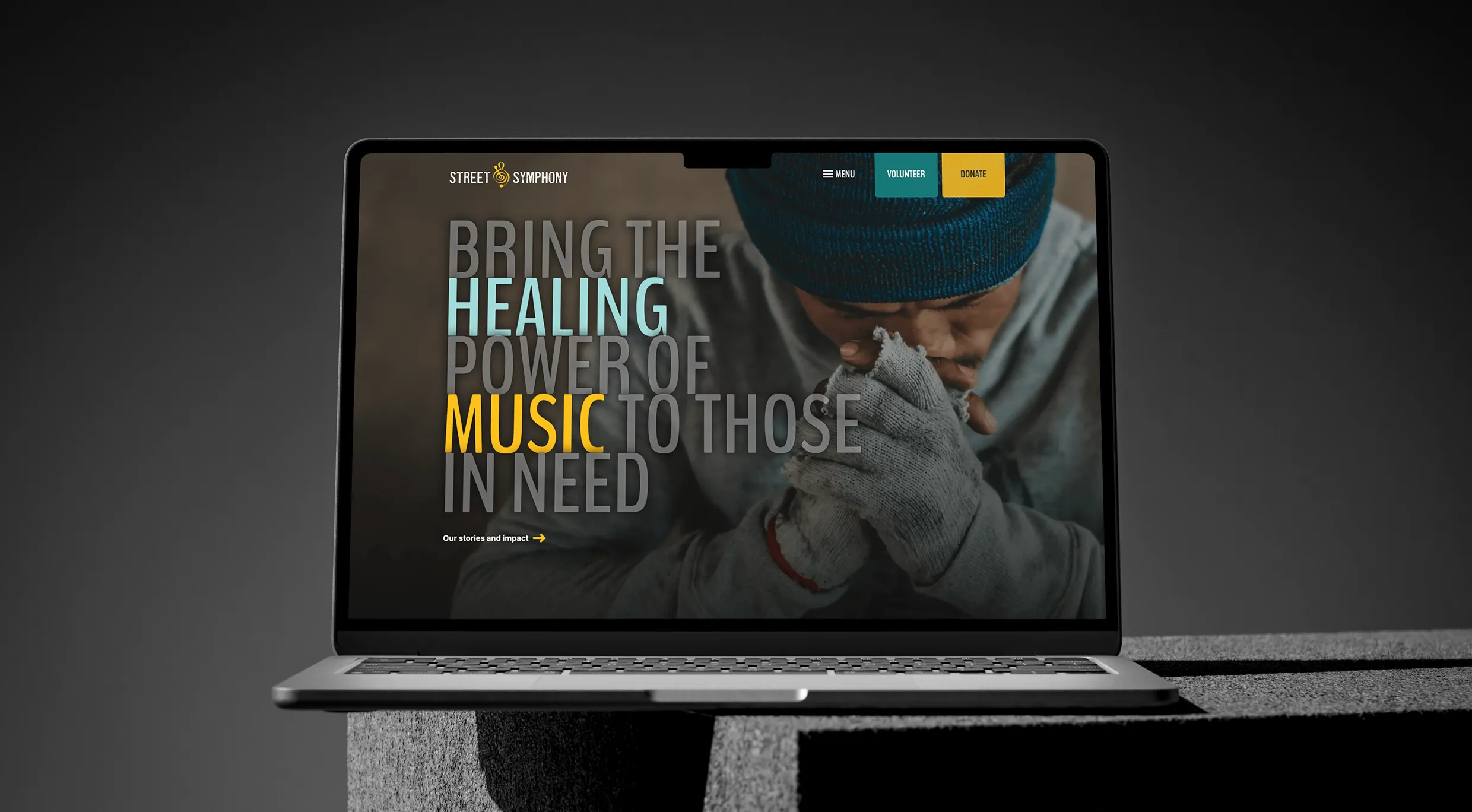 Laptop displaying the Street Symphony website on screen