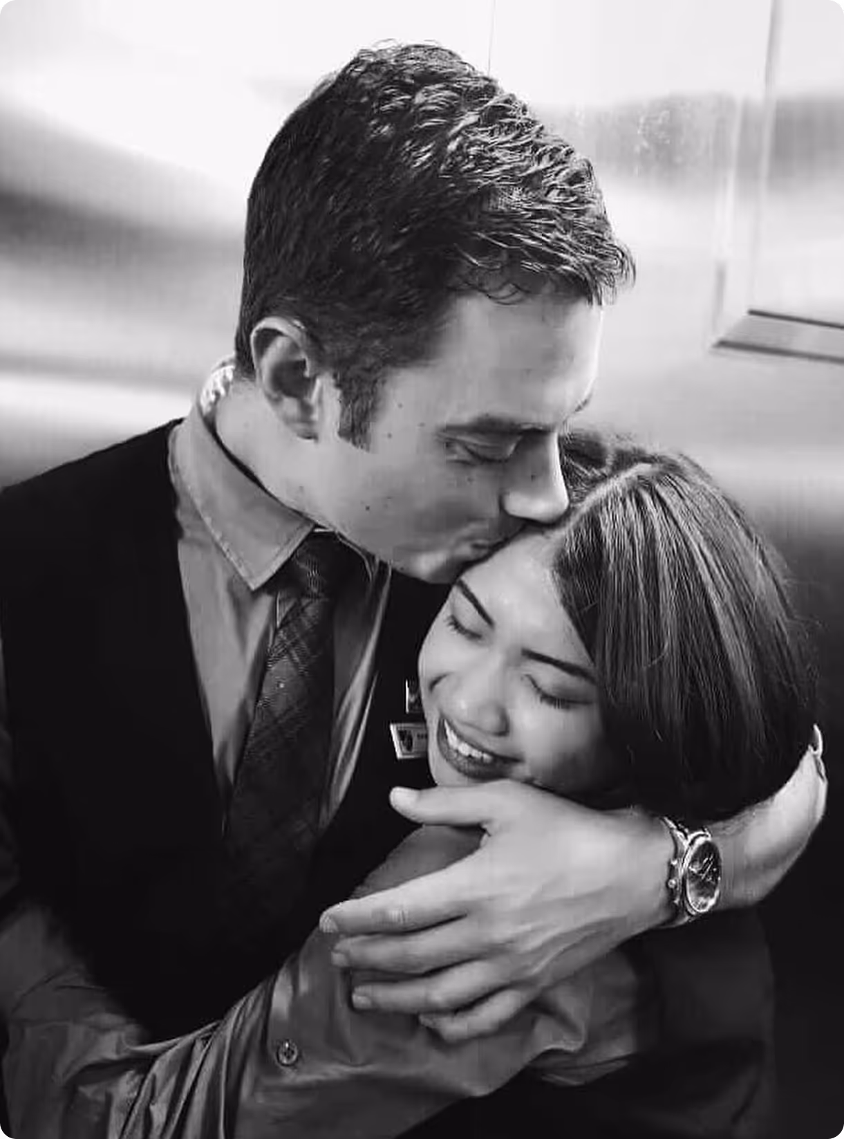 A couple of people that are hugging each other.