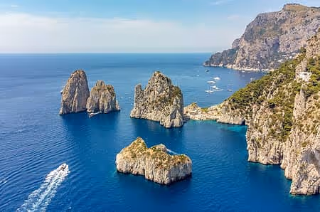 An aerial view of a boat in a body of water.