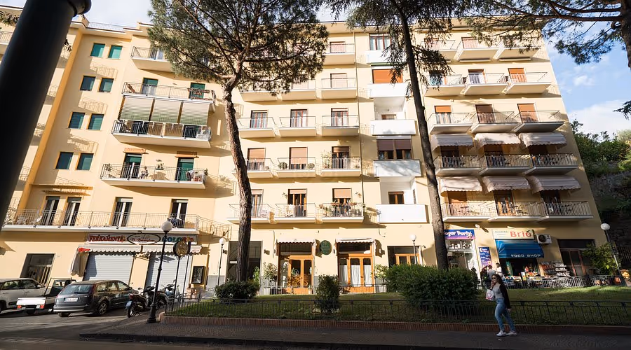 A tall building with balconies and balconies on the balconies.
