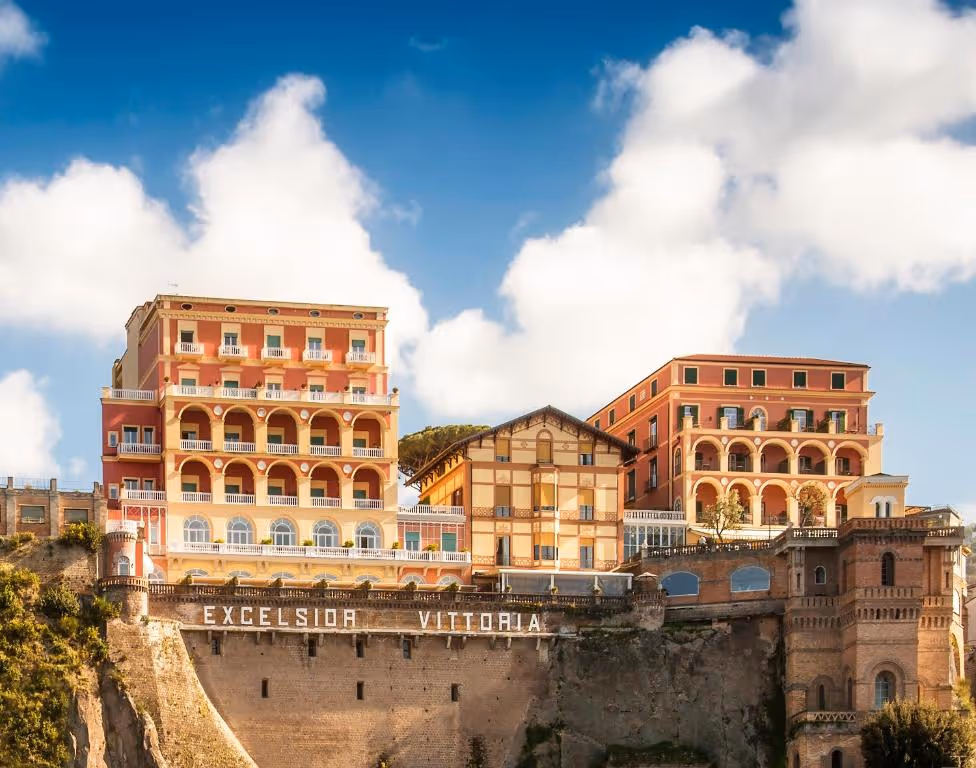 A large building on top of a cliff.