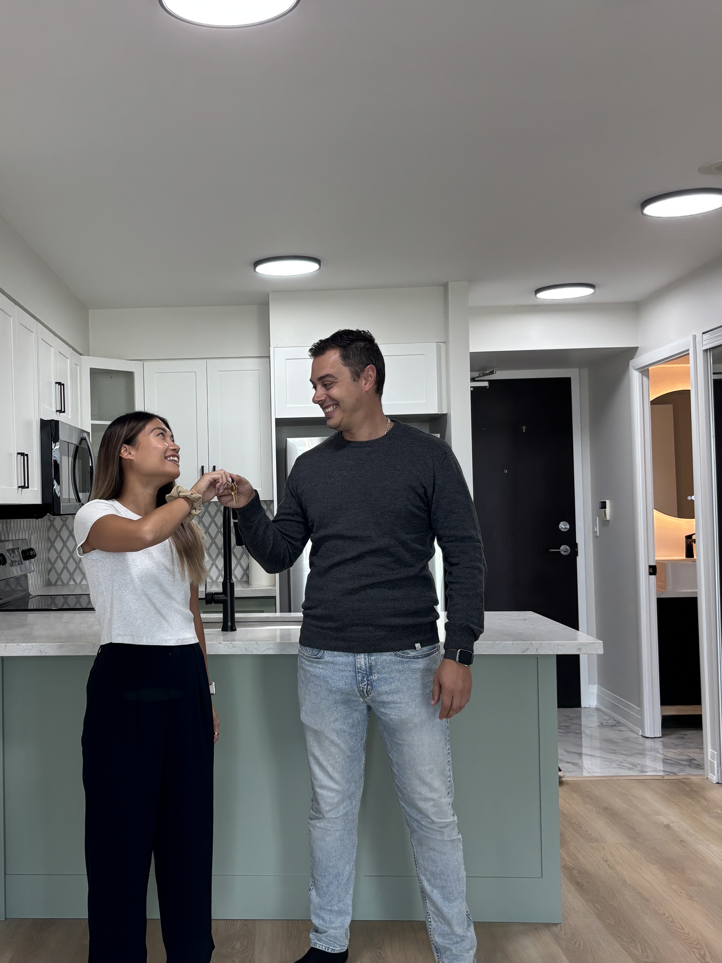 A man and a woman posing for a picture.