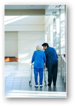 A person helping a person with a walkerAI-generated content may be incorrect.