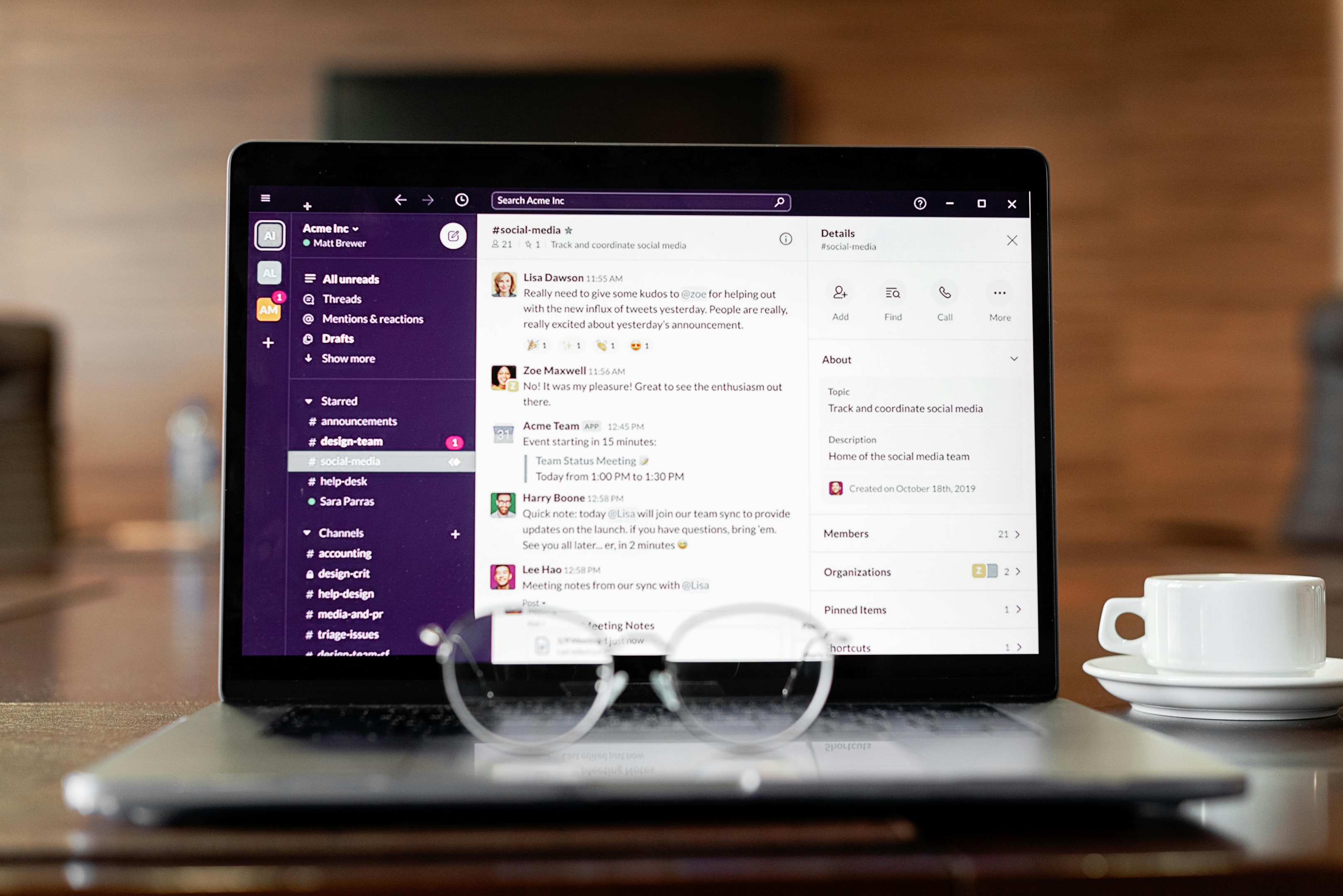 A Laptop screen showing an open slack channel.