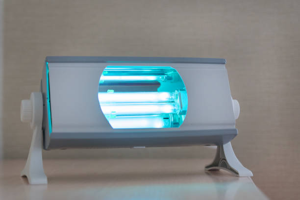 Blue UV sterilization lamp for disinfection on neutral background