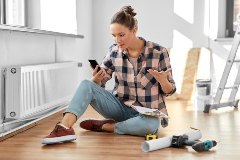 Women siting and looking towards phone