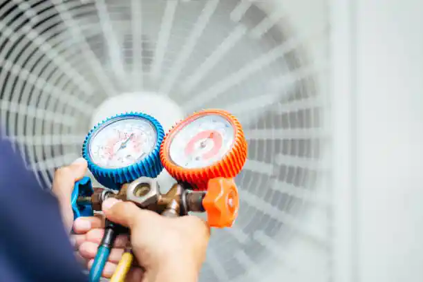 Pressure gauges for HVAC maintenance with blue and orange dial indicators