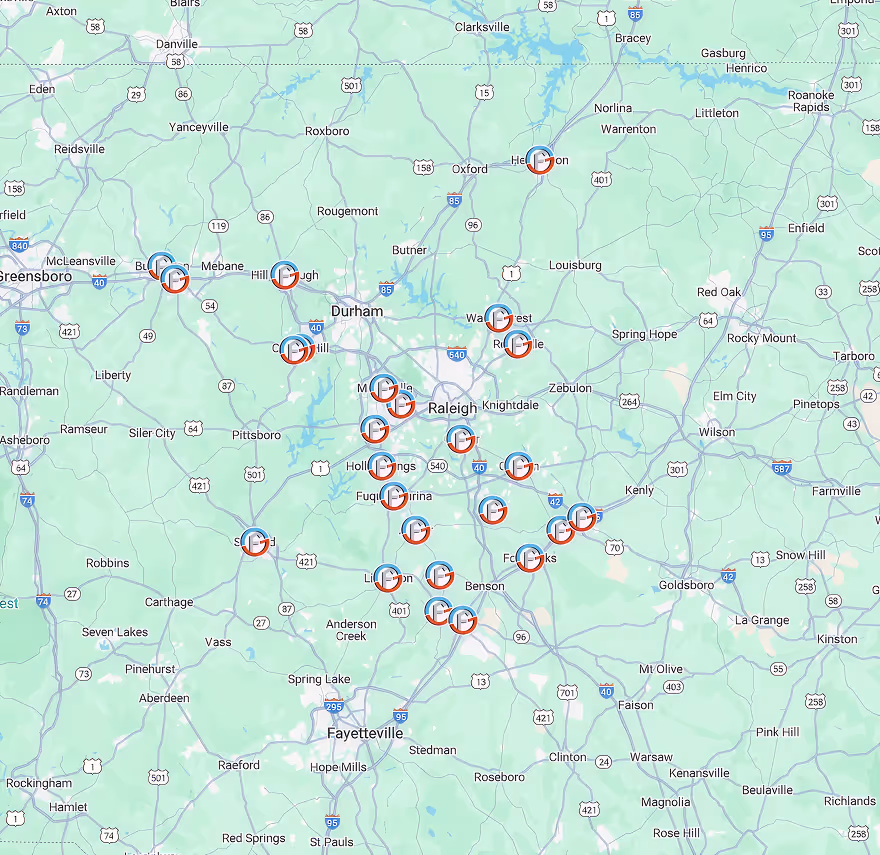 Map of North Carolina showing multiple red location markers around Raleigh