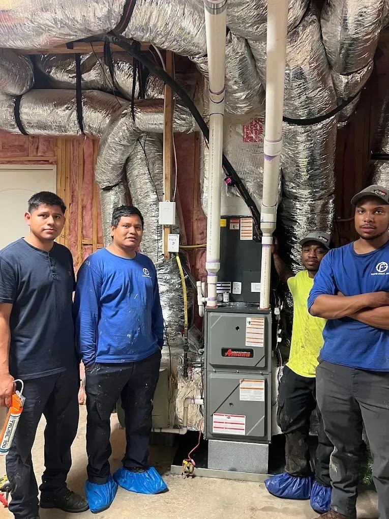 HVAC technician conducting preventive maintenance to minimize operational noise