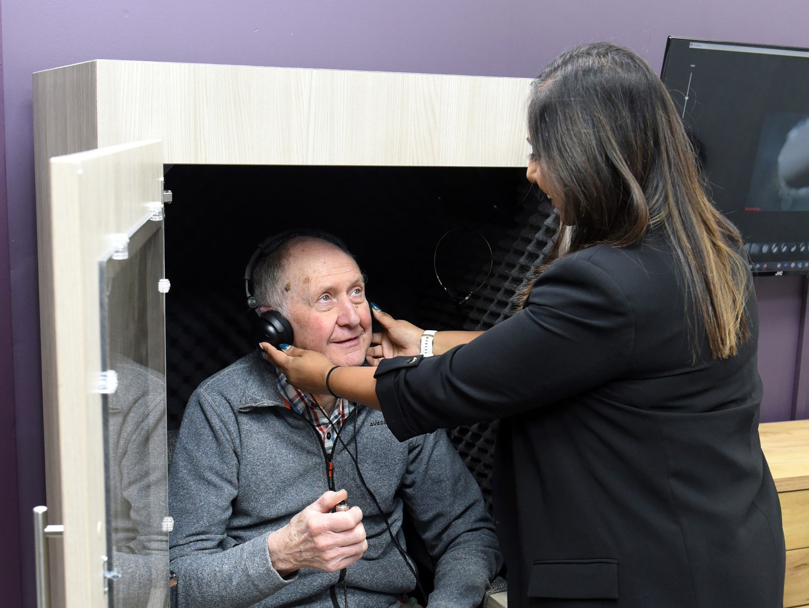 Tailored Hearing Solutions audiologist carrying out a hearing test with a patient in the Lancaster clinic