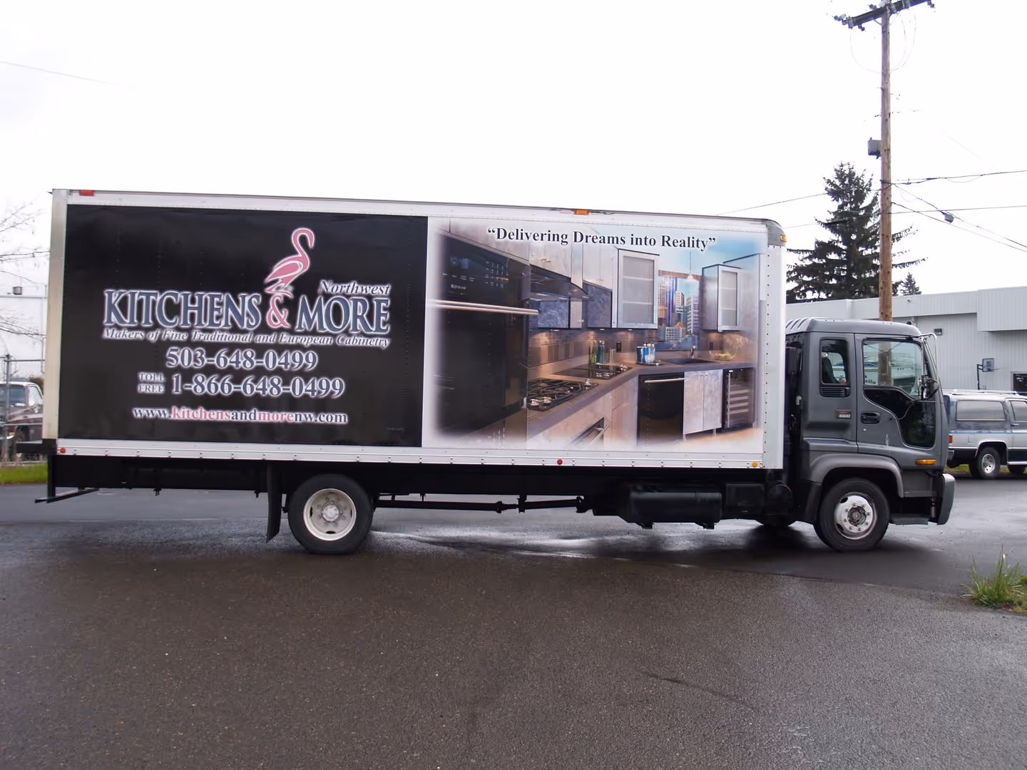 A truck is parked in a parking lot.