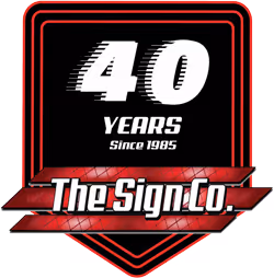 The logo for the 40 years of the sign co.