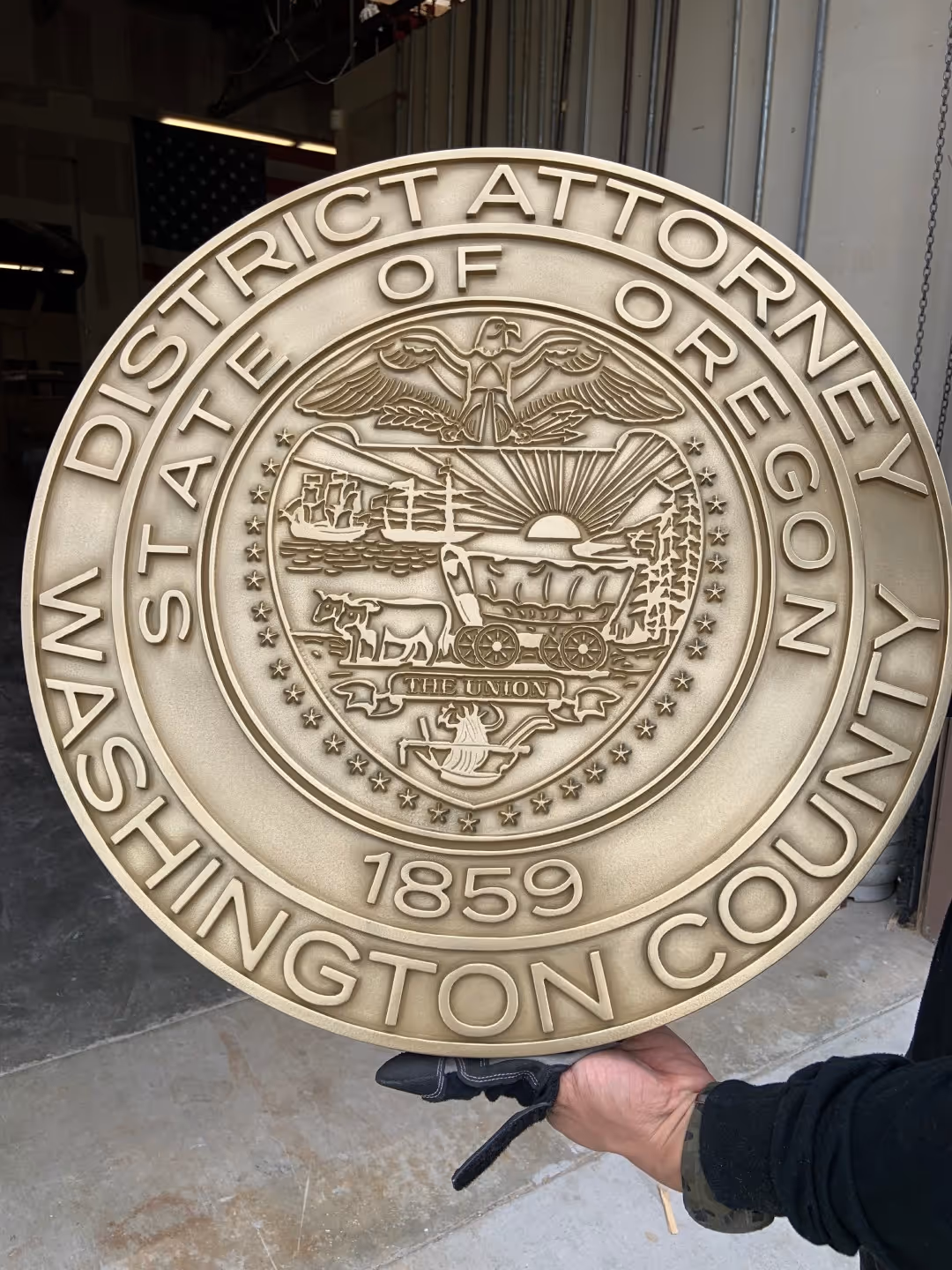 A person holding a sign that says district of orange county.