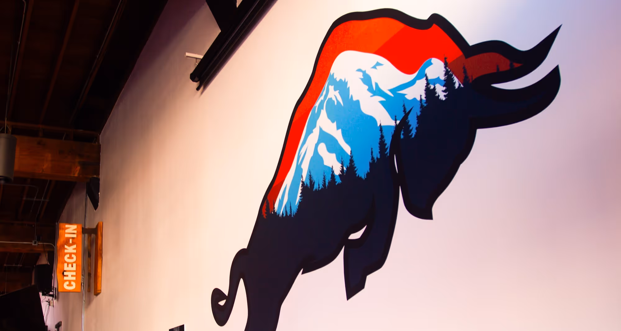 A bison painted on the side of a building.