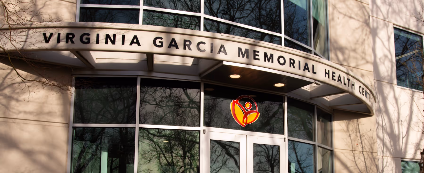 A large building with a sign on the front of it.