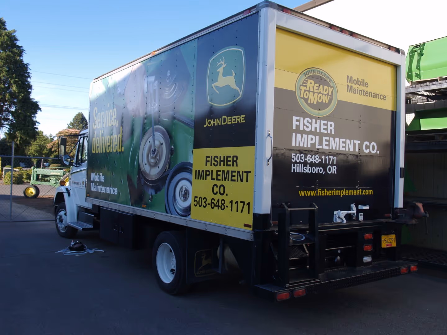A truck is parked in a parking lot.
