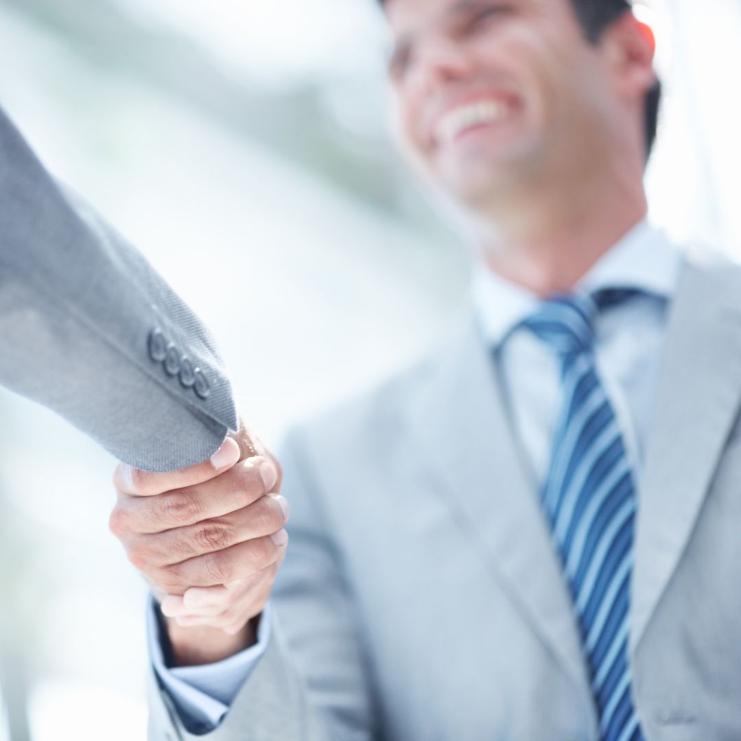 partner shaking hands