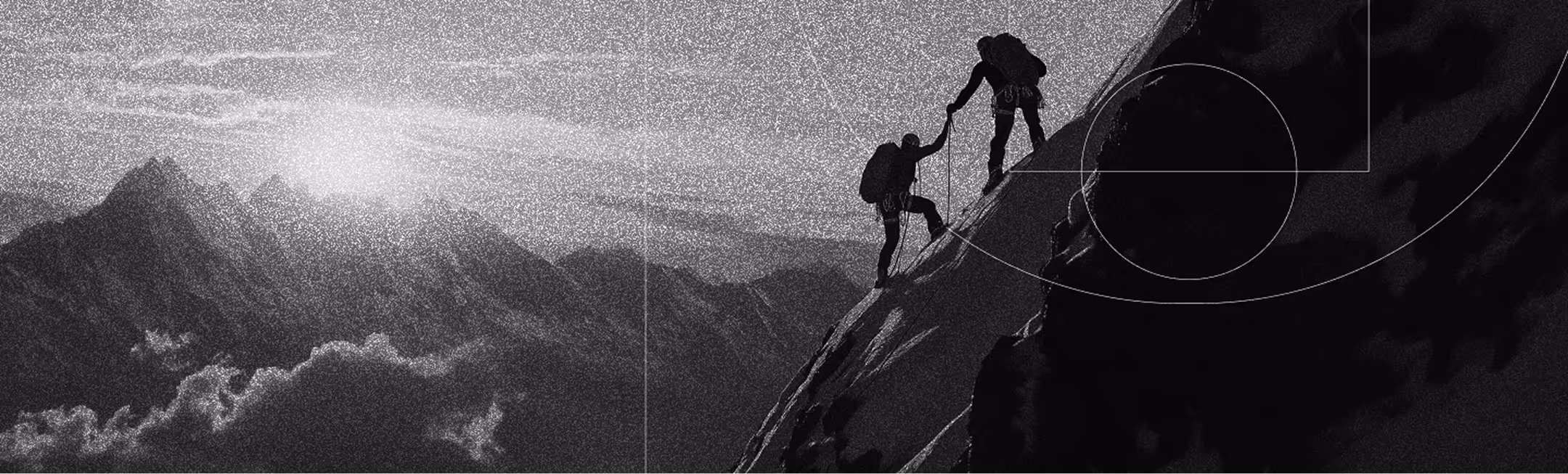 Two men climbing mountain