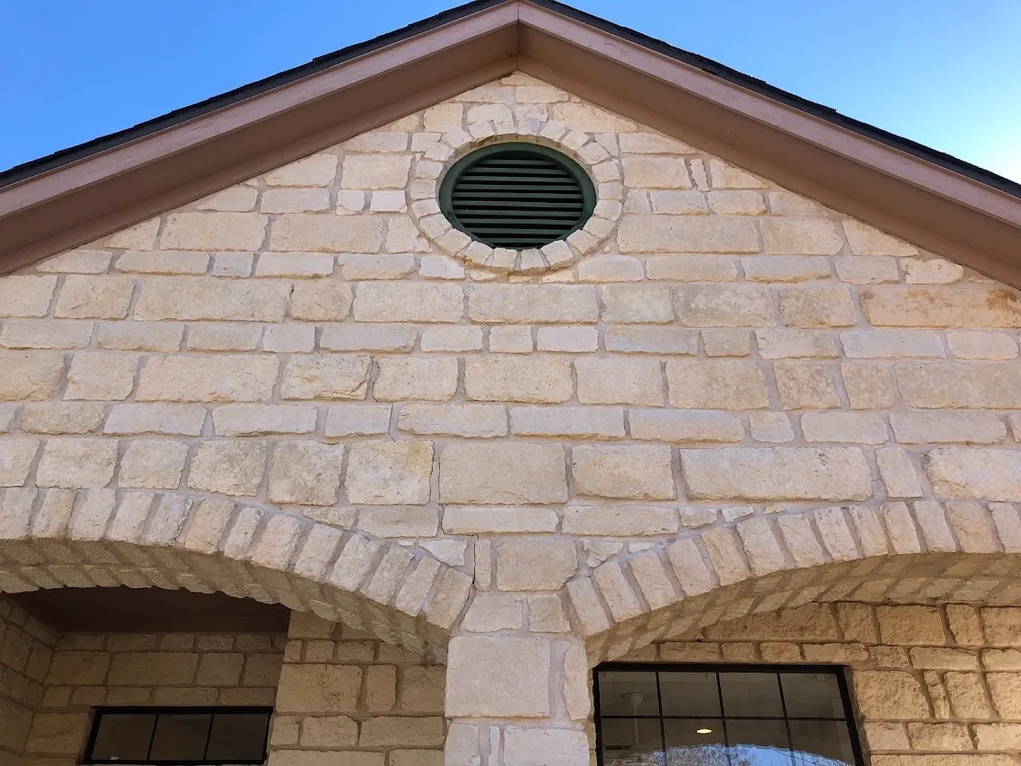 Cleaned stone exterior wall of a residential property