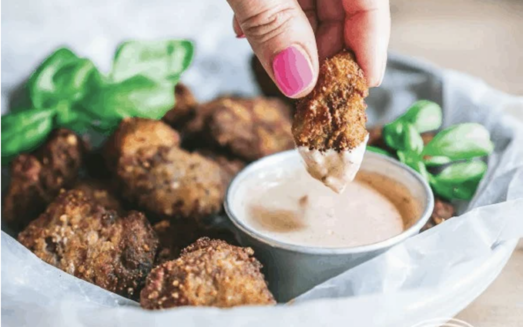 close up of carnivore diet nuggets being dipped