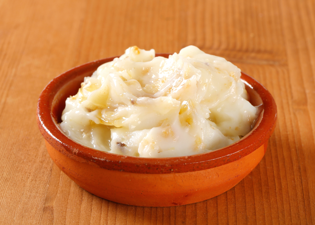 Duck fat spread in terracotta bowl