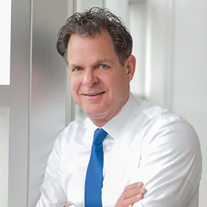 Tony-Jeary wearing white sleeves with blue tie