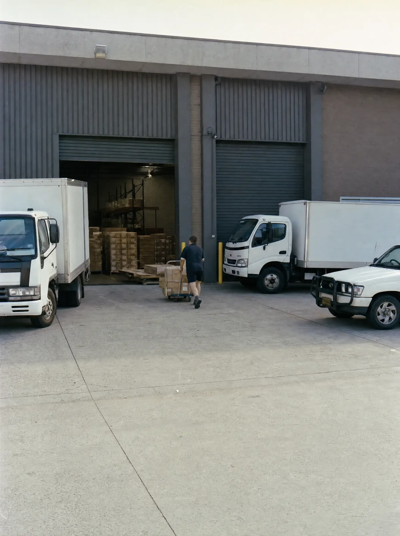 Delivery trucks at a distribution branch on an industrial estate