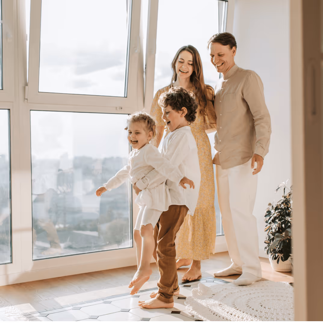 Happy family celebrating their new home in California