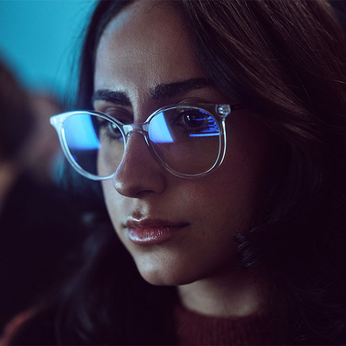 A woman sitting in front of a computer