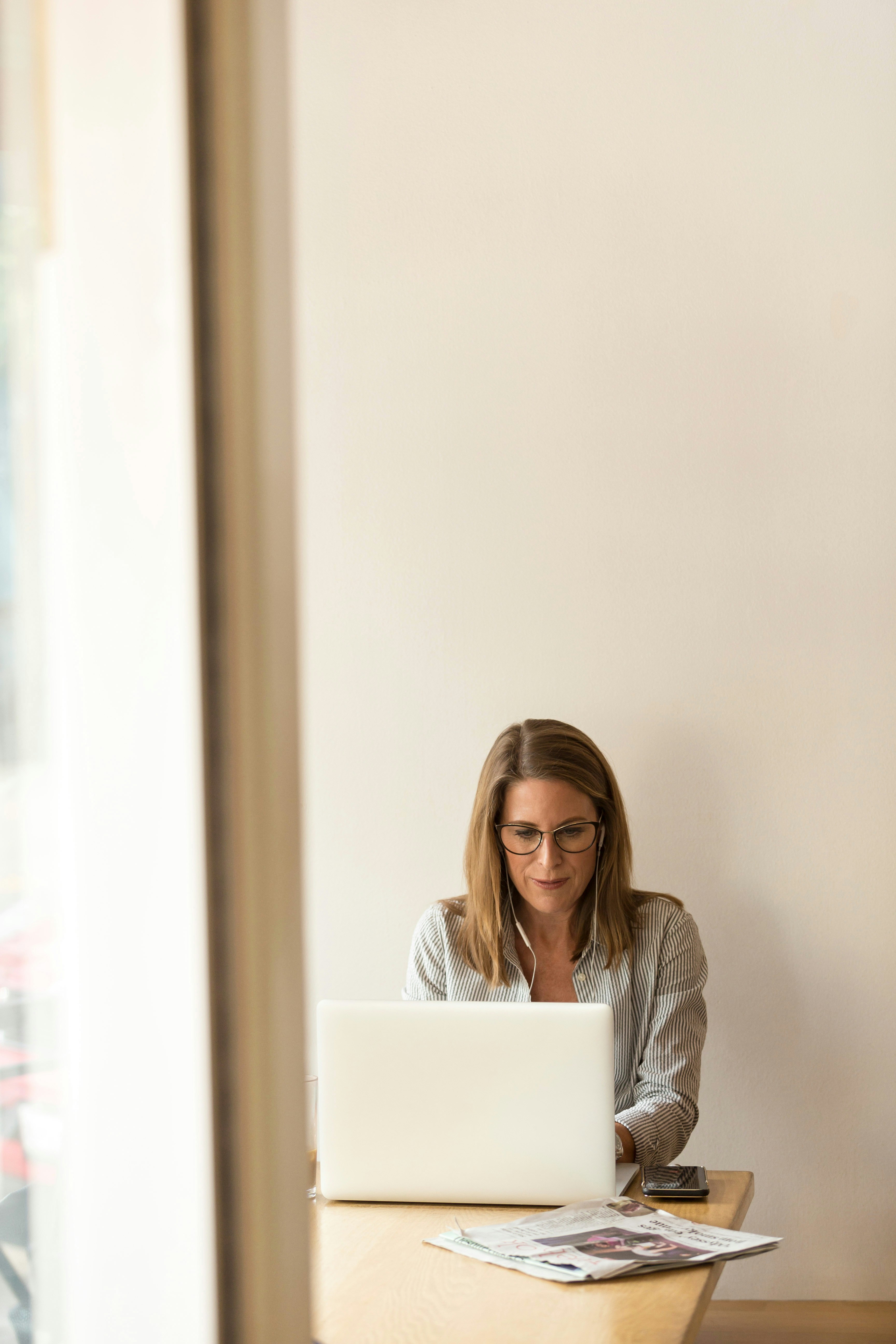 A woman working on a laptop