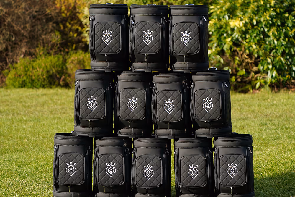 Golf ball holders customised with embroidered logos. 
