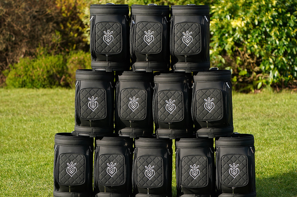 Golf ball holders customised with embroidered logos. 
