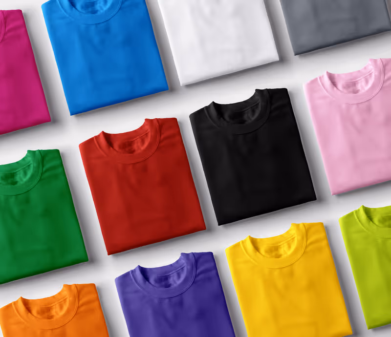 A bunch of plain T-Shirts in multiple colours. 