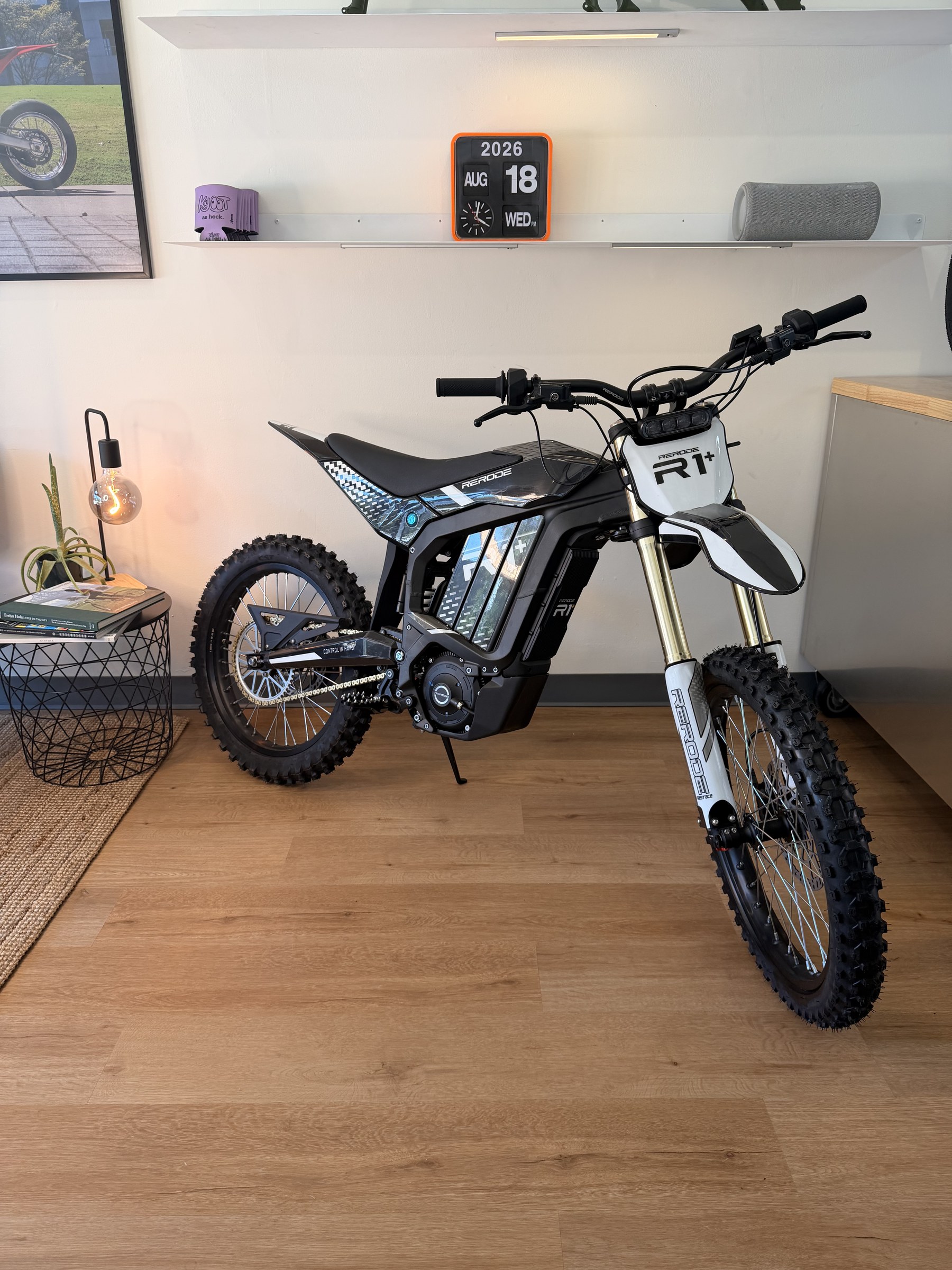 Rerode R1+ electric dirt bike, front three-quarter view showing the R1+ number plate