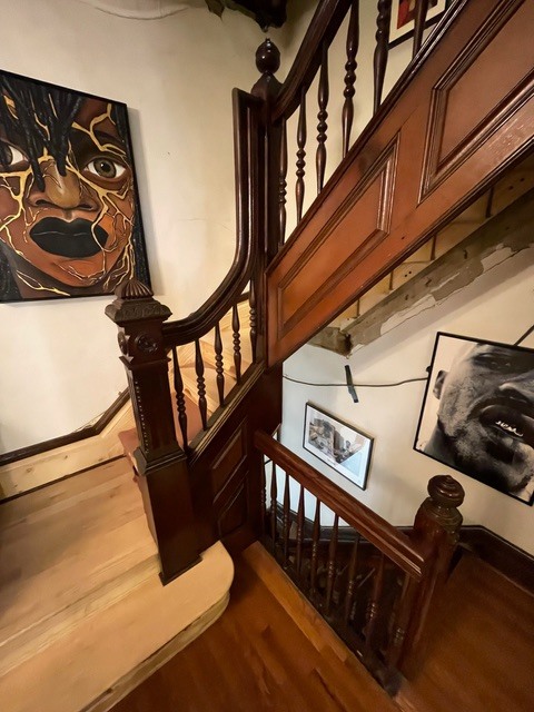 Wood staircase restoration with newel posts