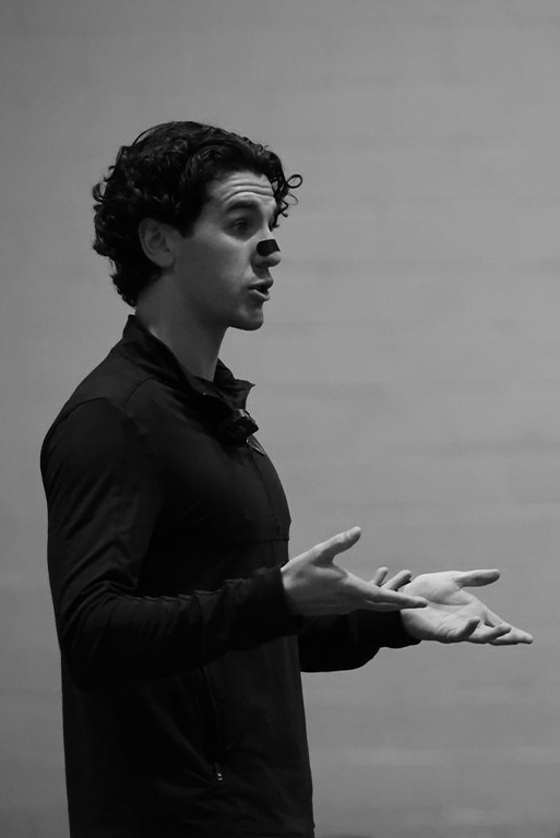Jack McMillan, performance coach and former professional footballer, leading breathwork and movement training for athletes.