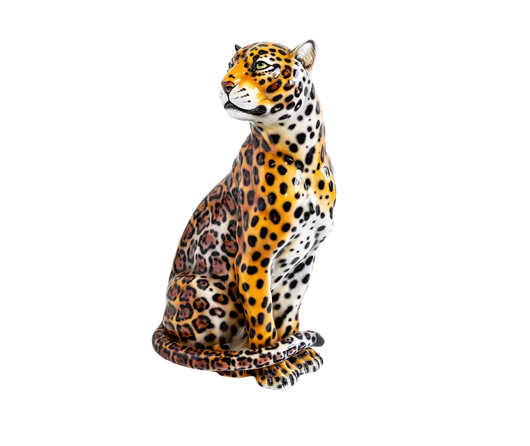 Detailed ceramic sculpture of a sitting jaguar with distinct orange, black, and white spotted fur.