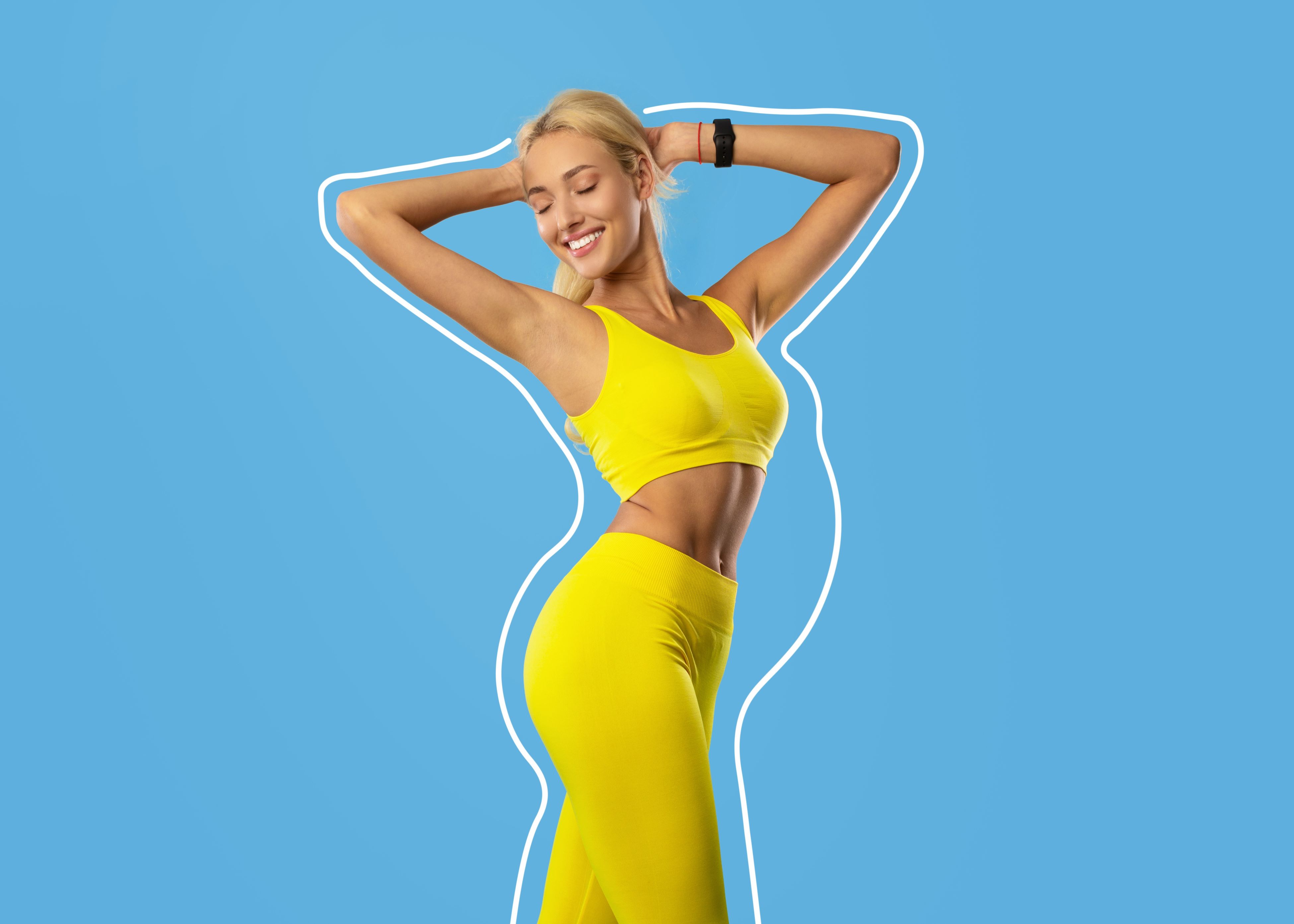 A woman in a yellow sports bra and leggings.