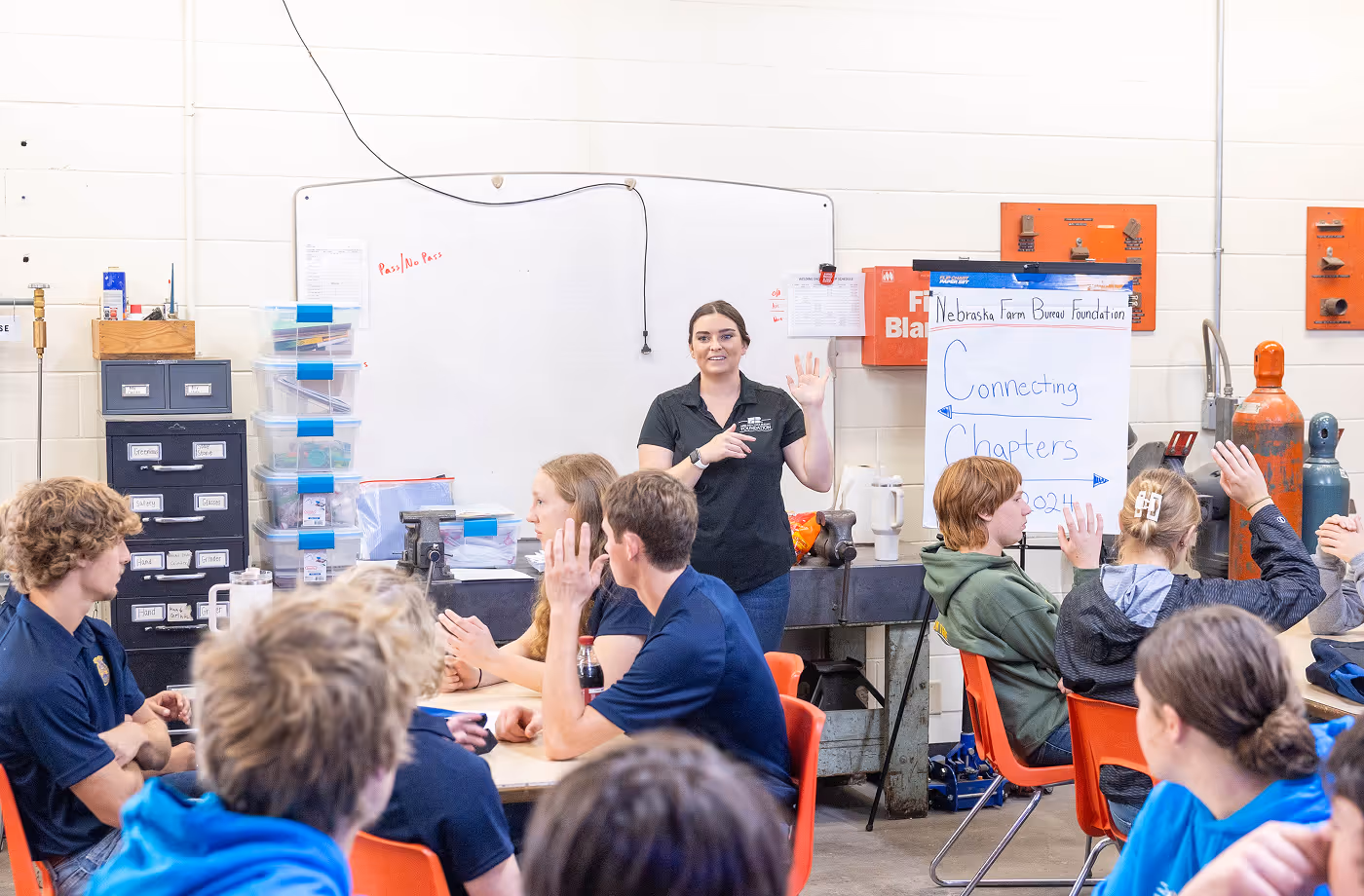 Woman teaching students