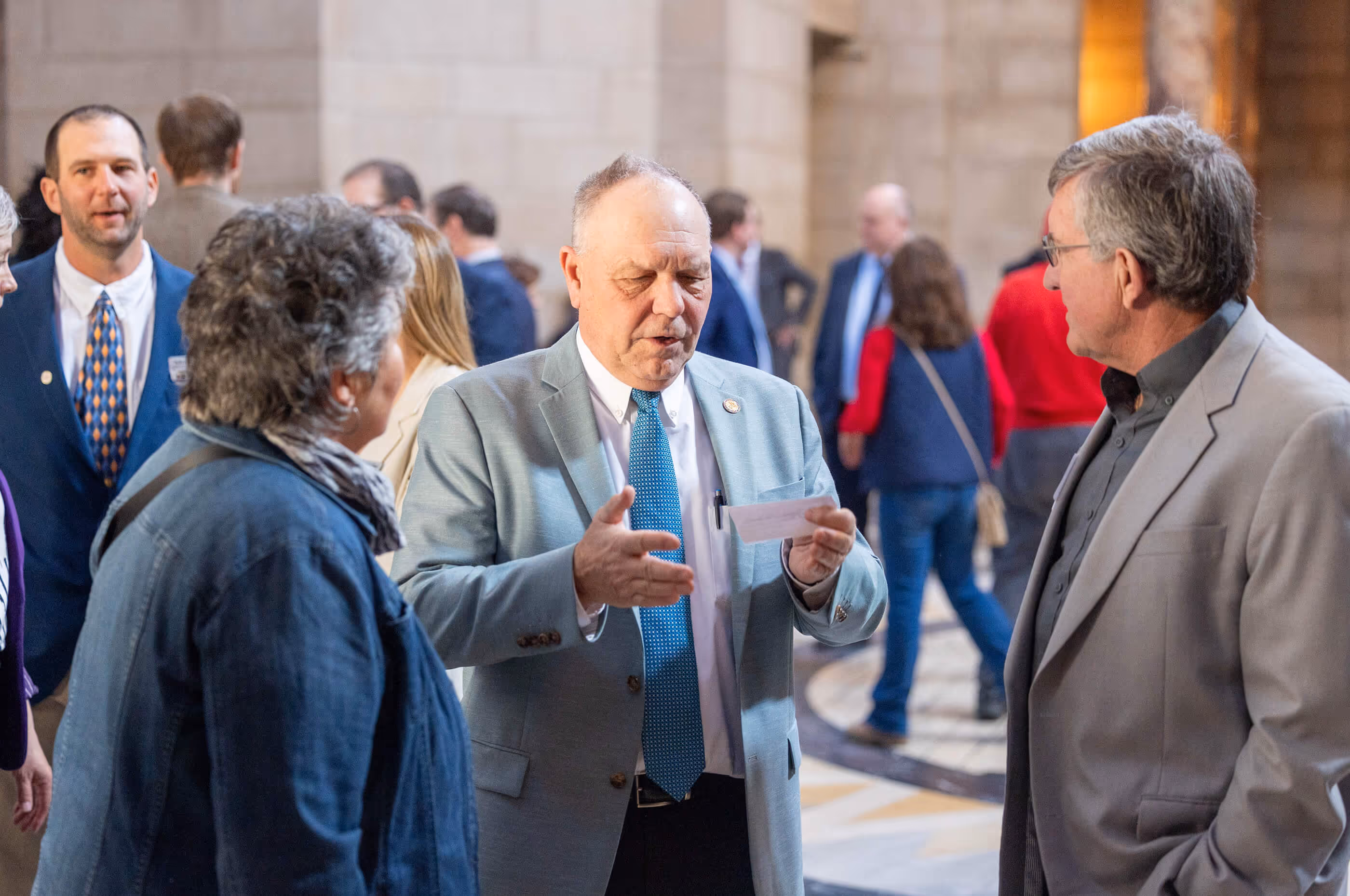 Three people talking