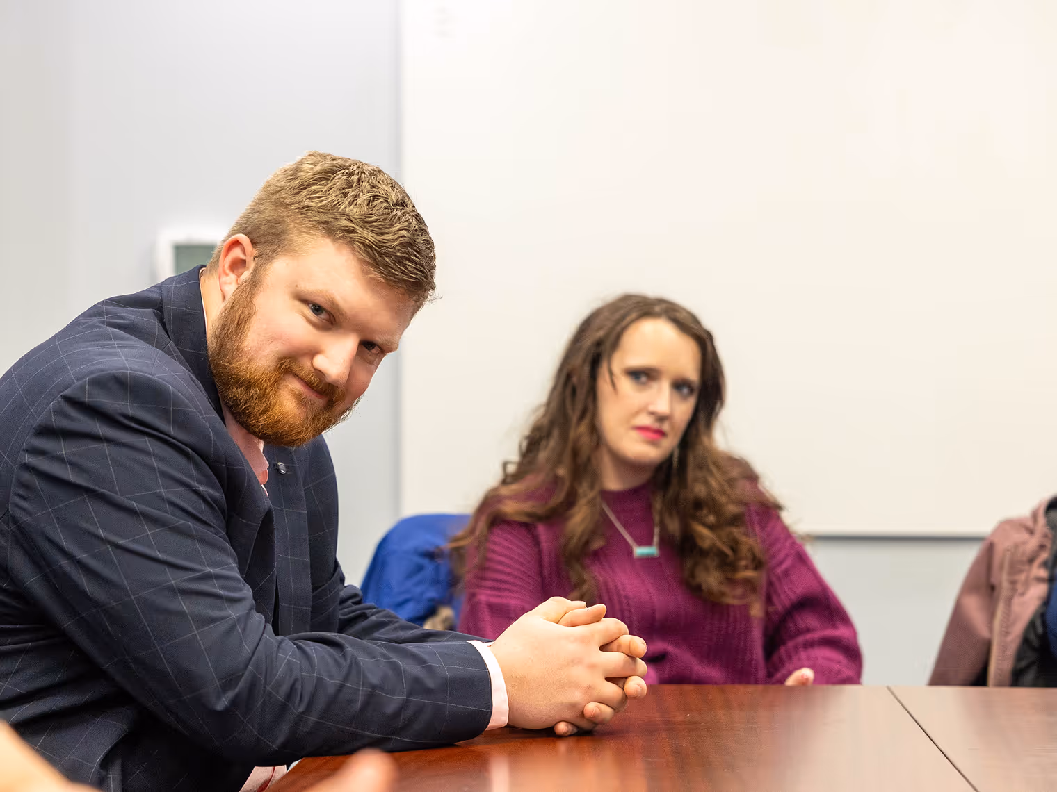 Man and woman sitting at a table