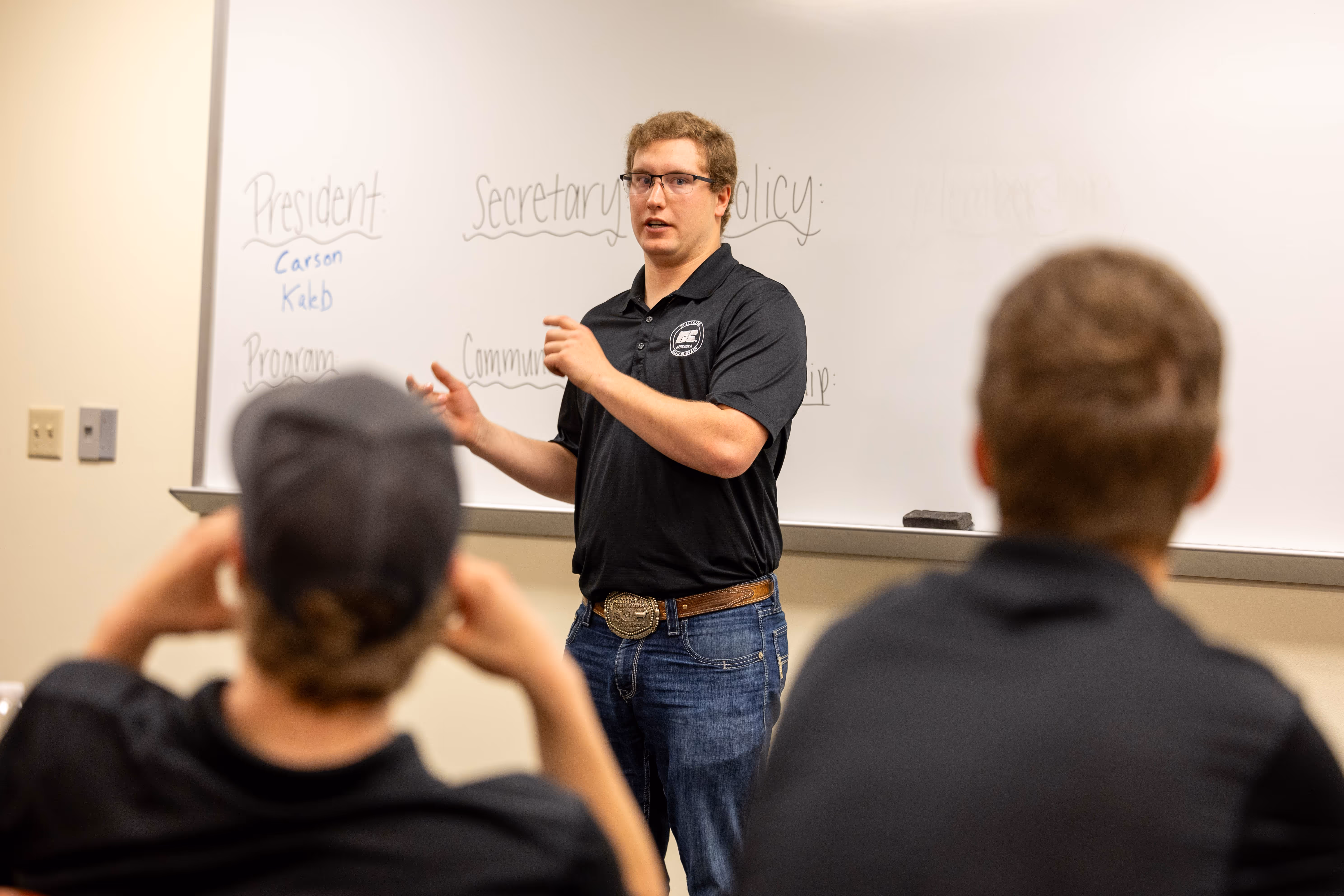 Man speaking to class