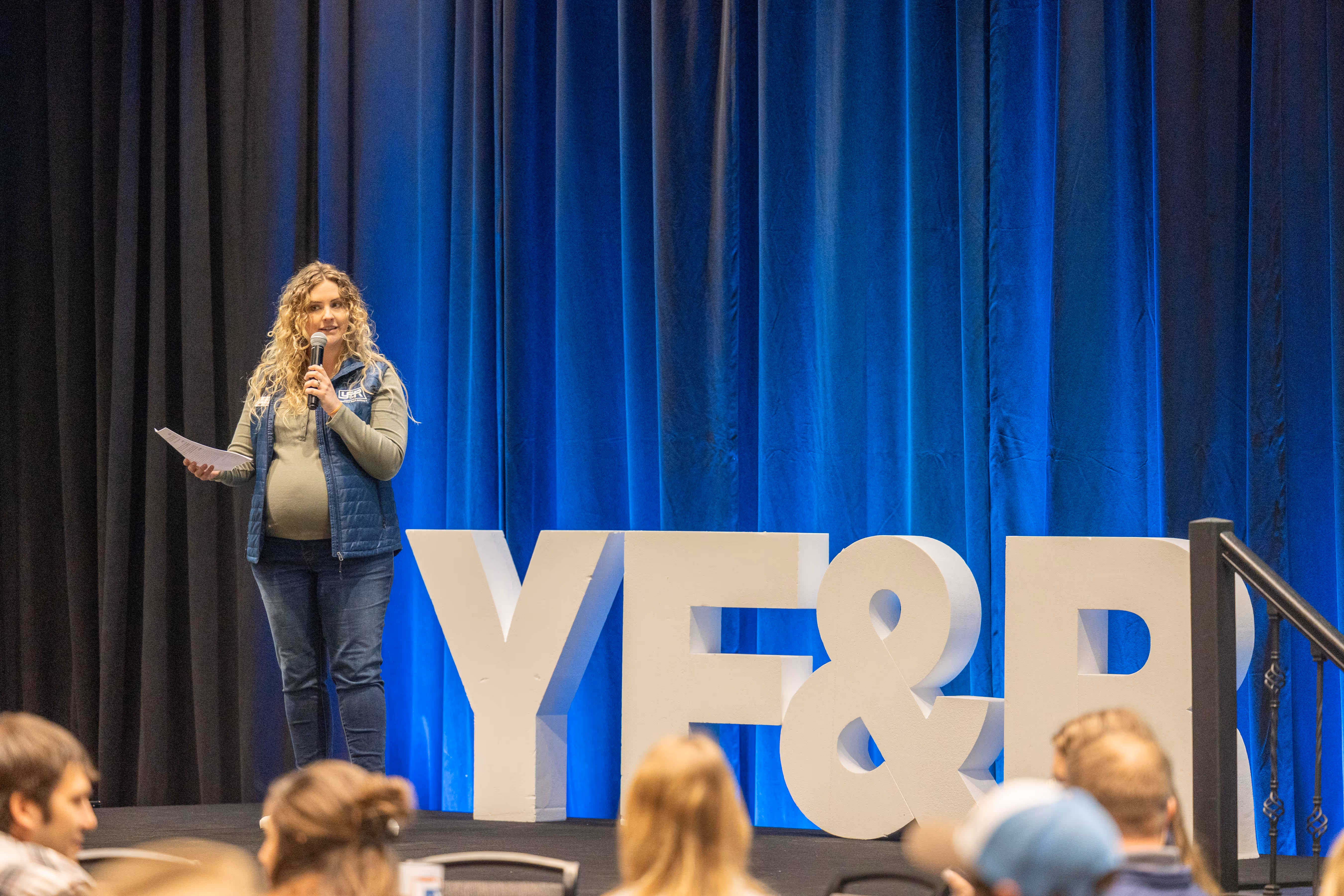 Woman speaking at a conference