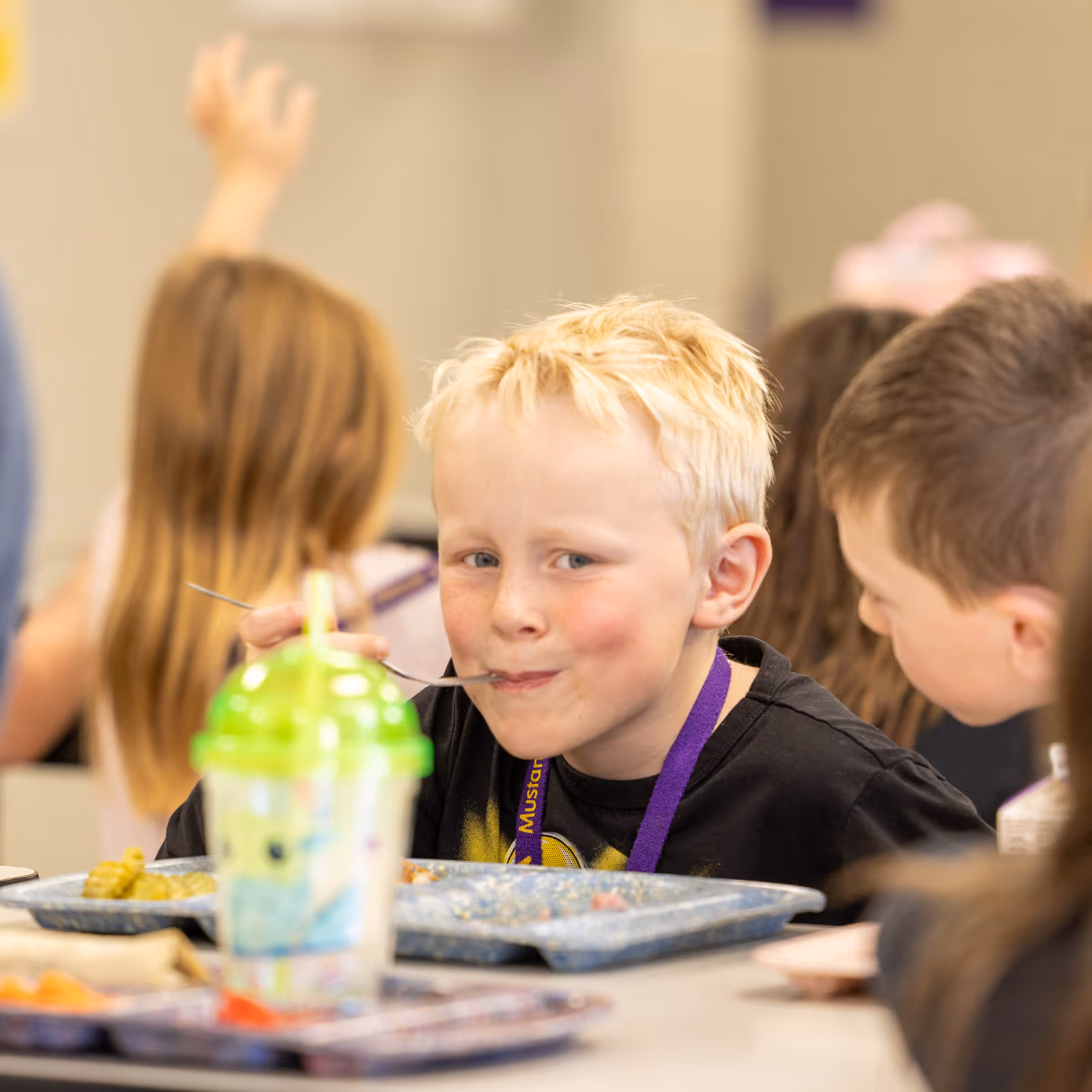 Boy eating at a table