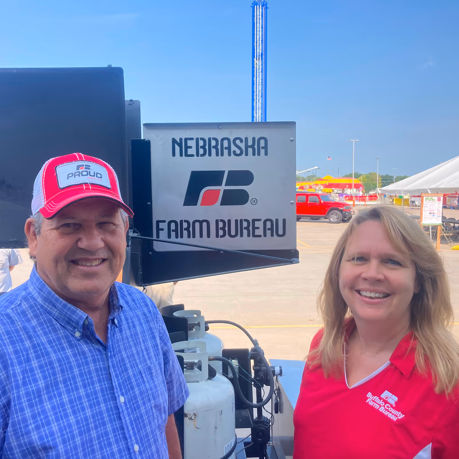 Man and a woman smiling