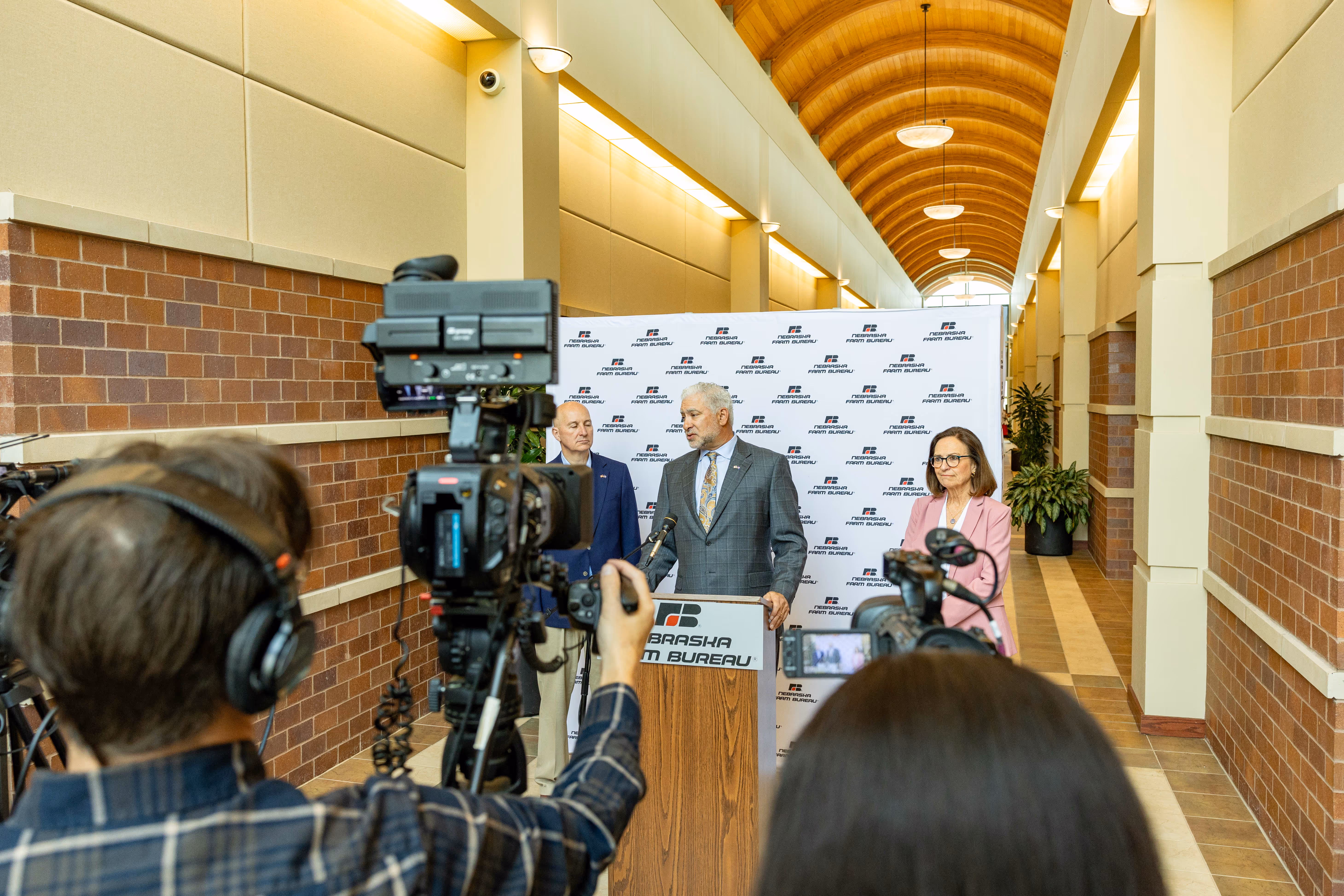 Man speaking to press